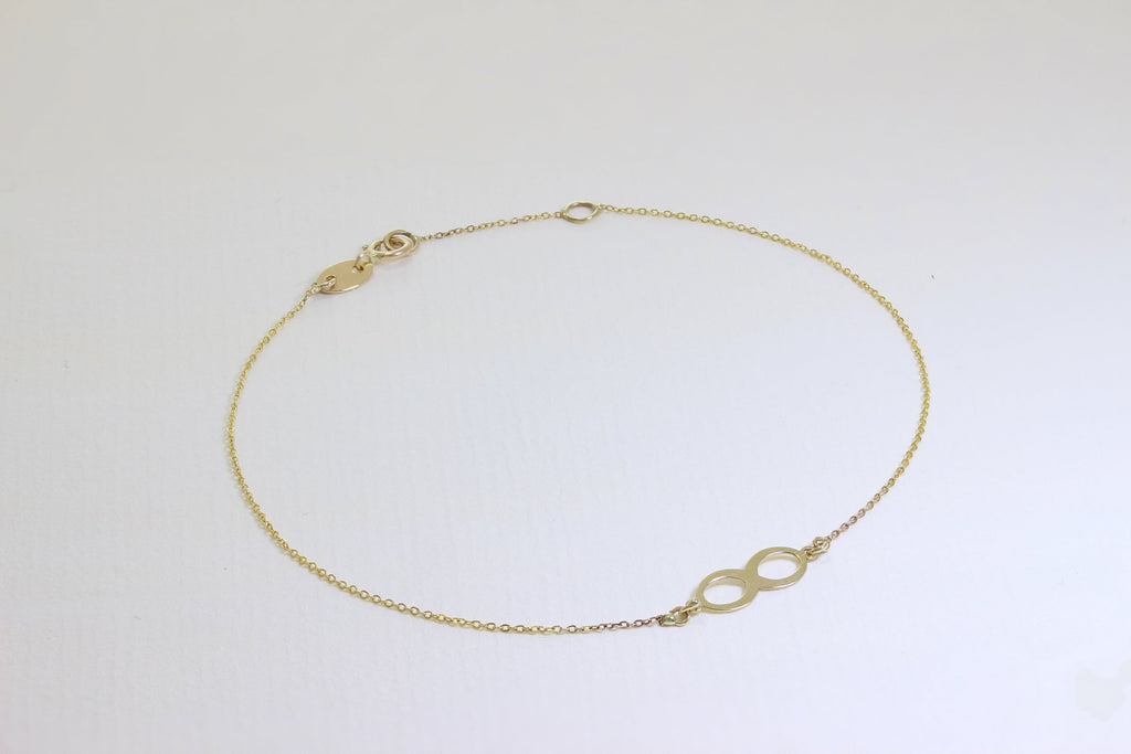 Feines Armband aus 9 Karat Gold mit Unendlichkeitszeichen und Verlängerungskette, 19 cm