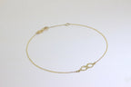 Feines Armband aus 9 Karat Gold mit Unendlichkeitszeichen und Verlängerungskette, 19 cm