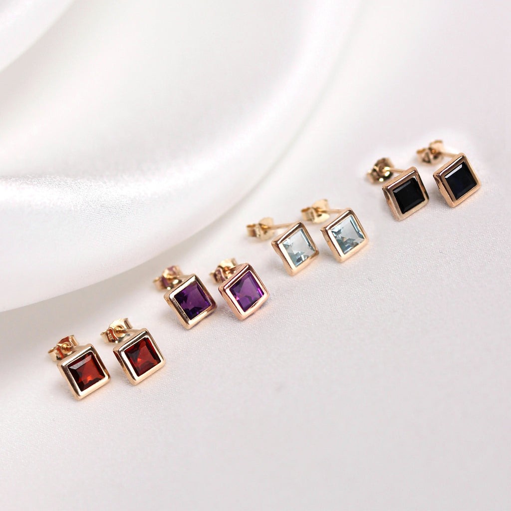 Ohrstecker aus 9 Karat Gelbgold mit Edelstein, 5 mm