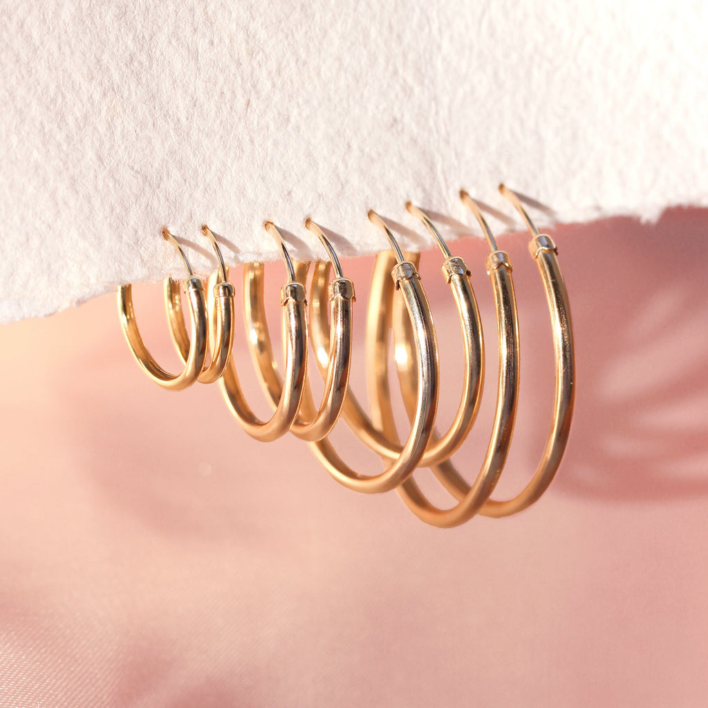 Einfache Ohrringe aus 9 Karat Gelbgold mit Kappe 18 mm - 32 mm