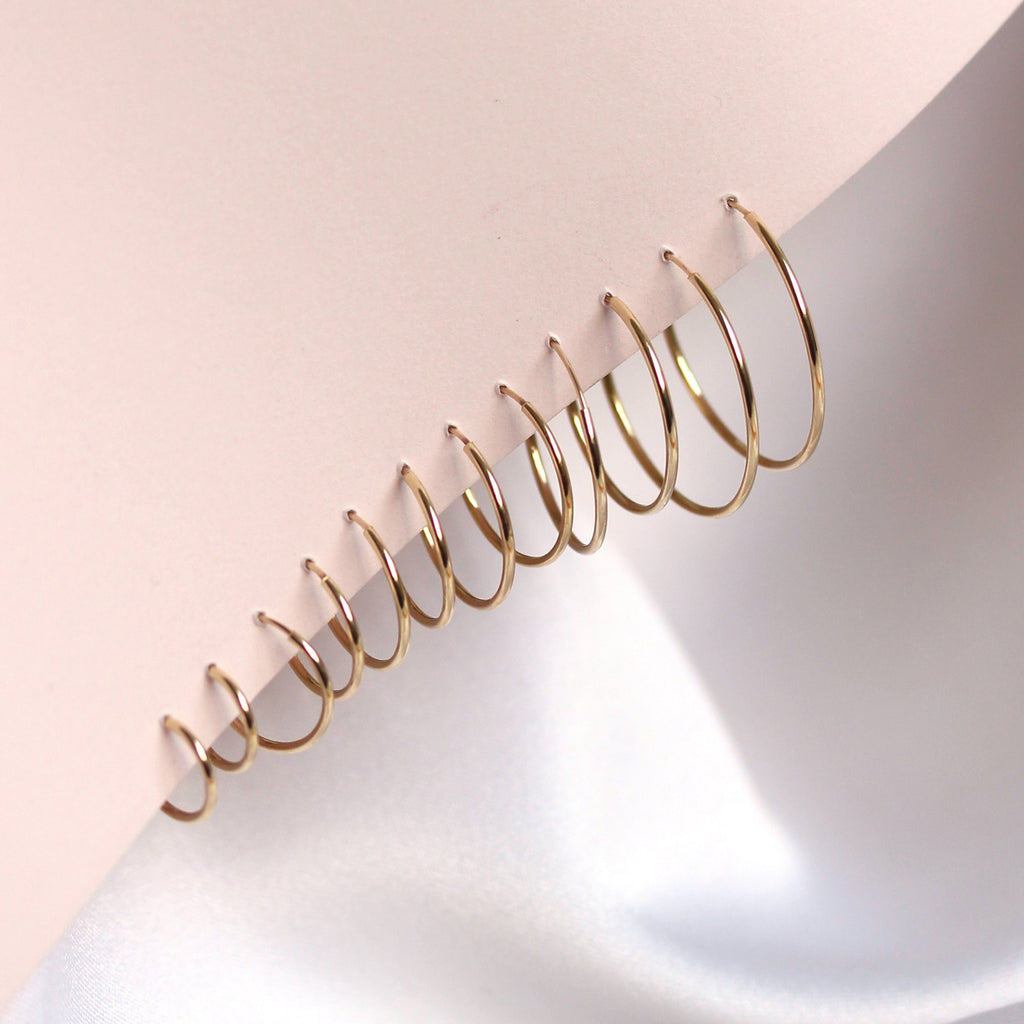 9 Karat Gold 0,8 mm Röhrenohrringe 8 mm - 20 mm