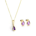 Set aus Anhänger und Ohrsteckern aus 9 Karat Gold mit Geburtsstein für den Monat Februar