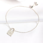 Personalisiertes Armband aus Sterlingsilber mit Initialen und Vorhängeschloss