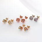 6 mm Knoten-Ohrstecker aus 9 Karat Gelbgold